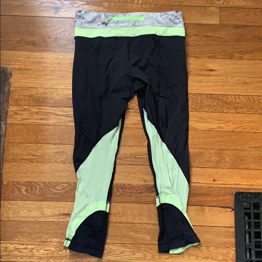 Lululemon size 6 crop leggings with green detail!